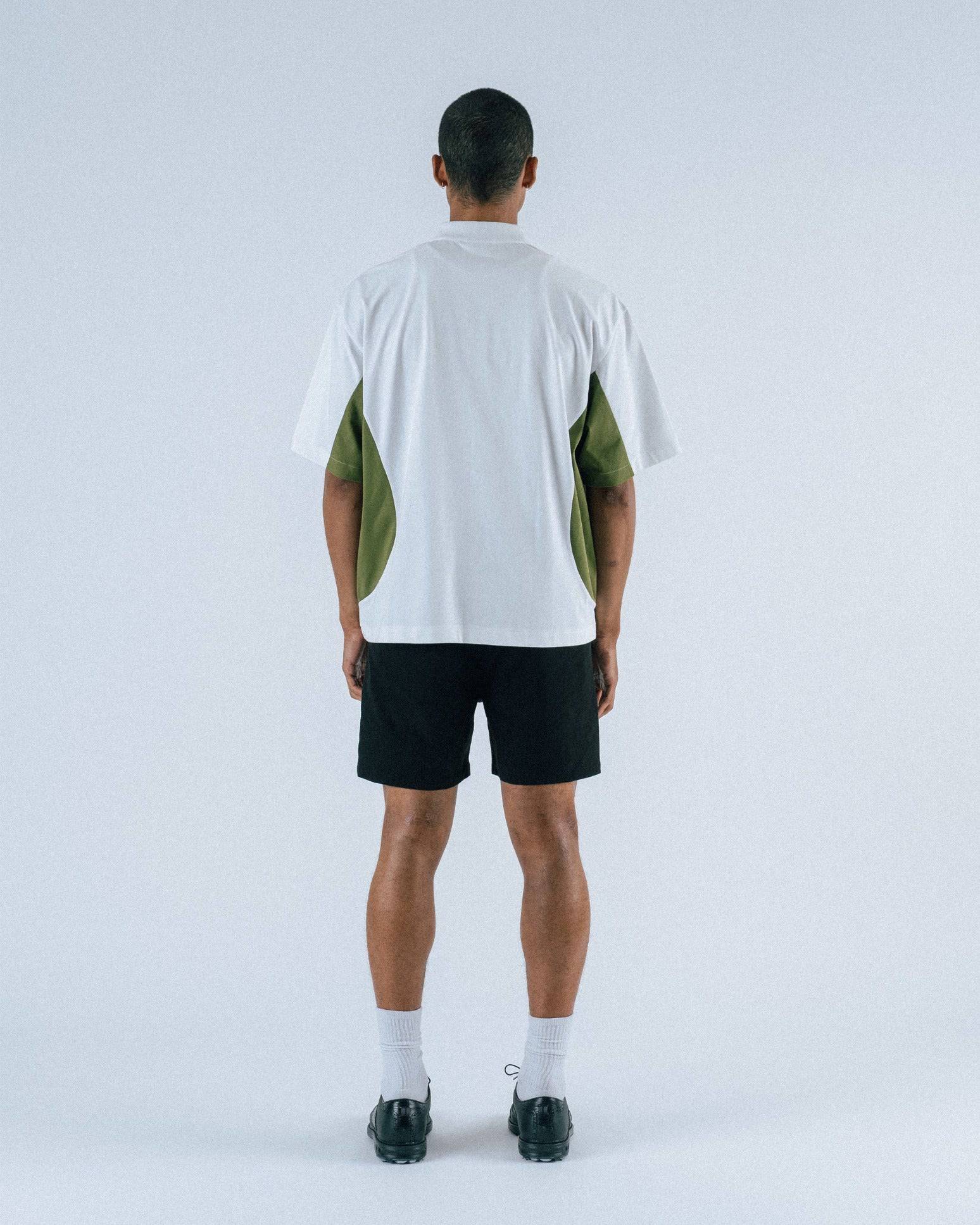 Assistant Jersey Zip Polo Shirt in white - front view