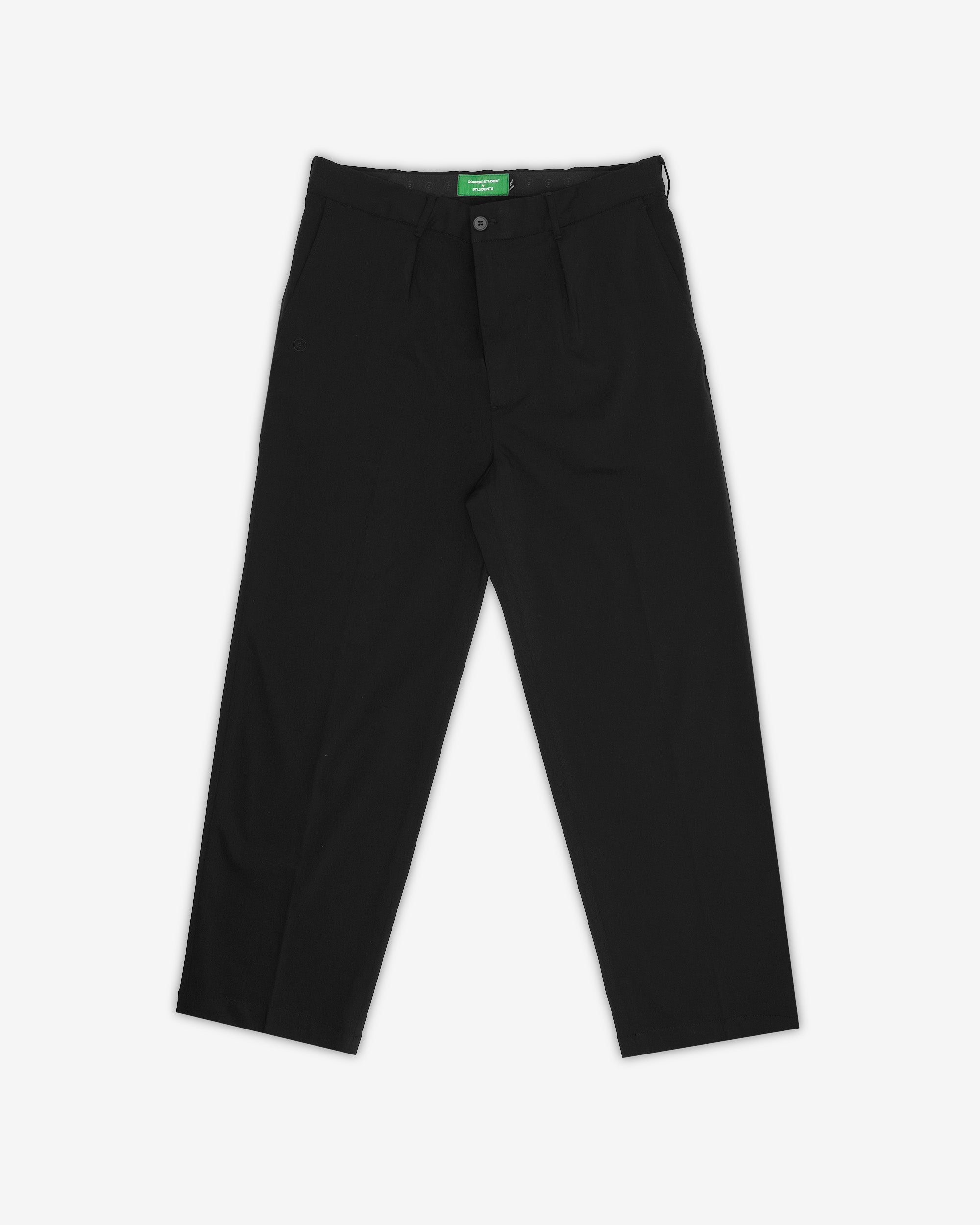 Black pants with a brand label on a white background