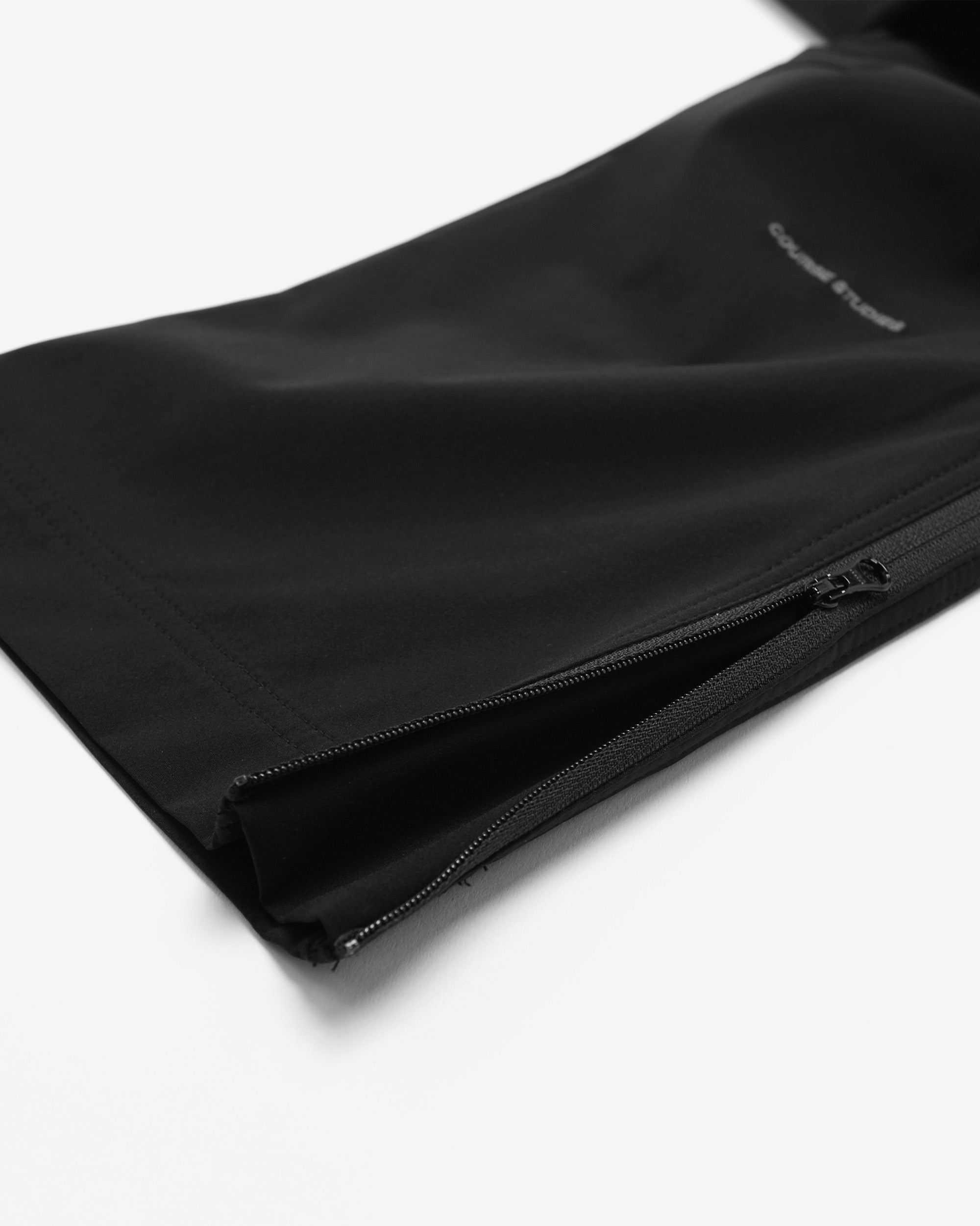 Black jacket with a zipper on a white background