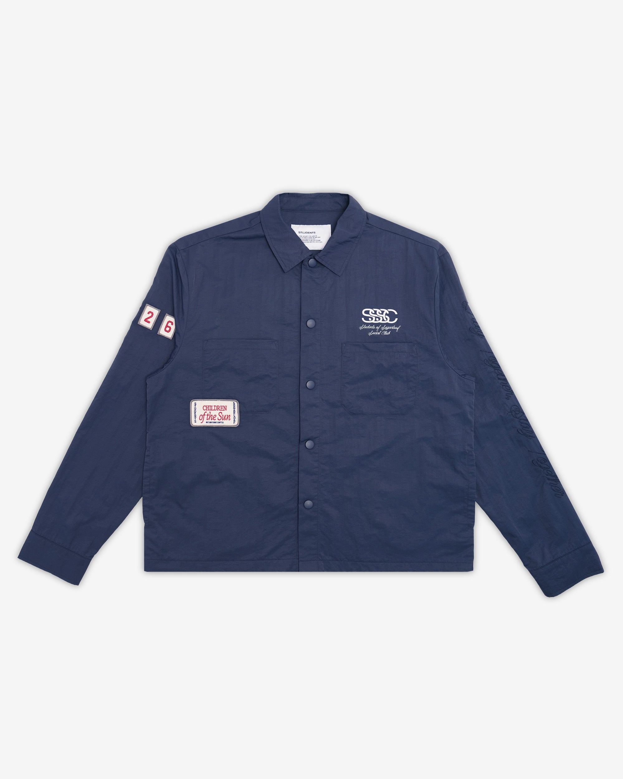 Navy blue shirt with patches on a white background