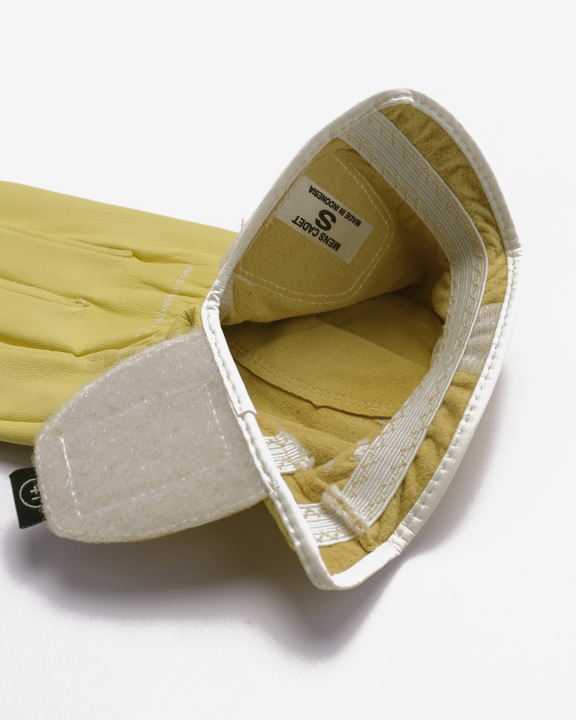 Yellow glove on a white background