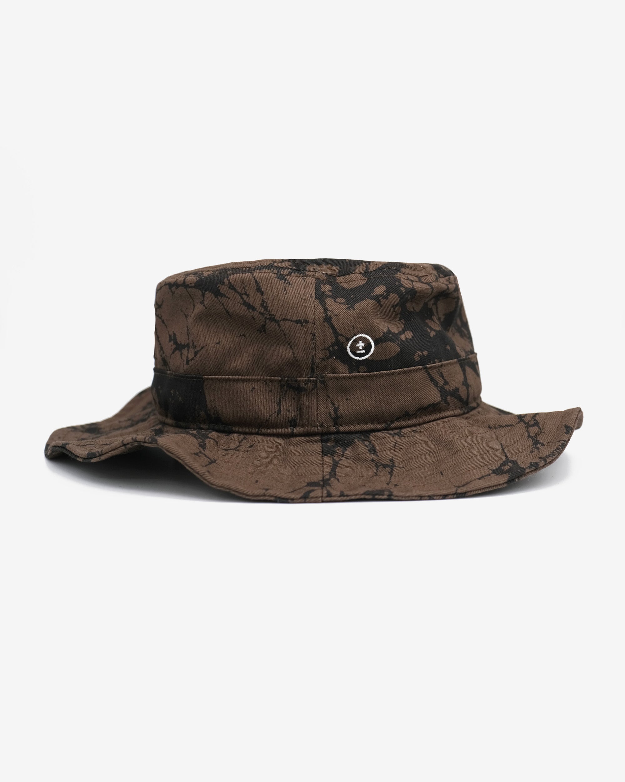 Brown camouflage bucket hat on a white background