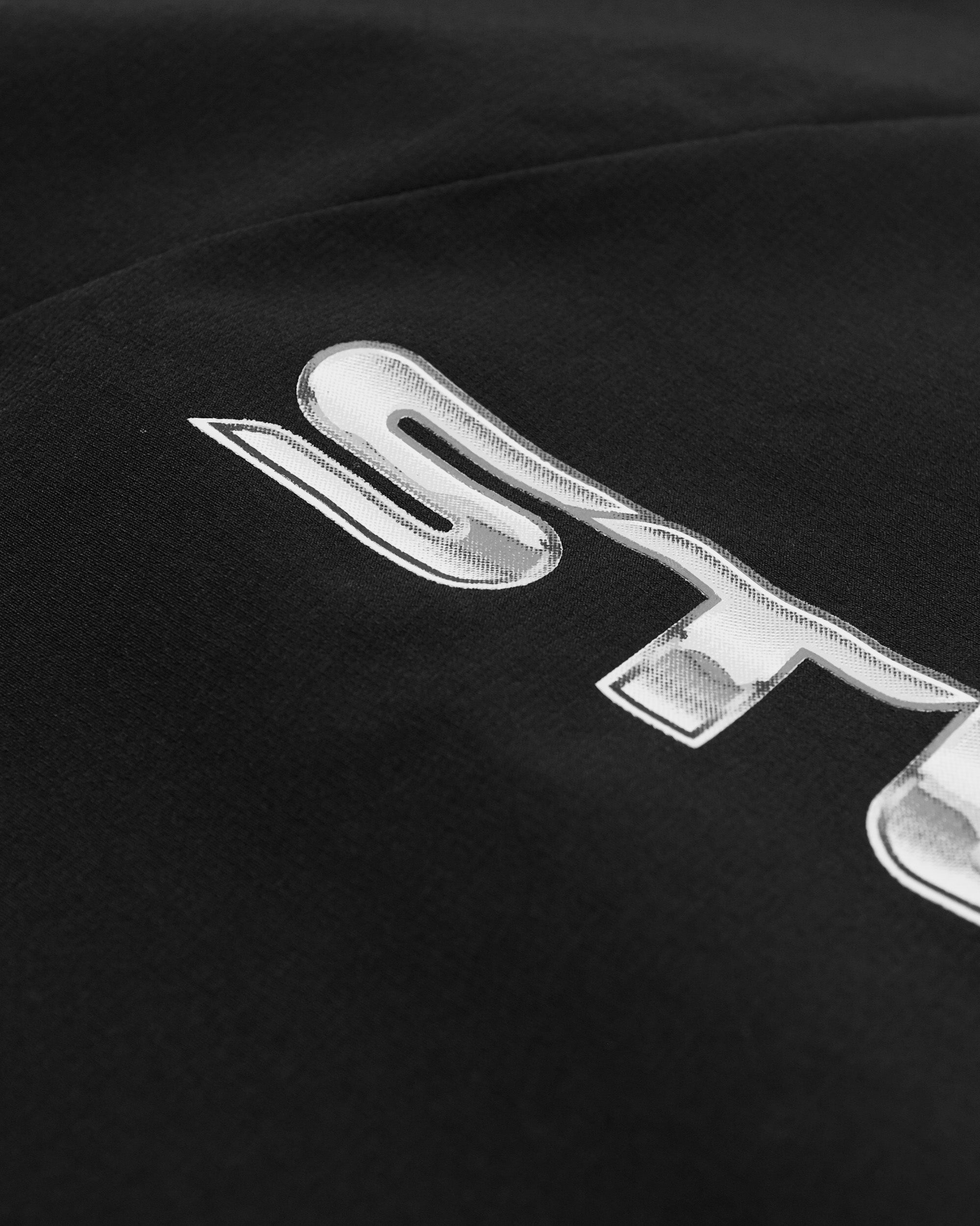 Close-up of a logo on a black background