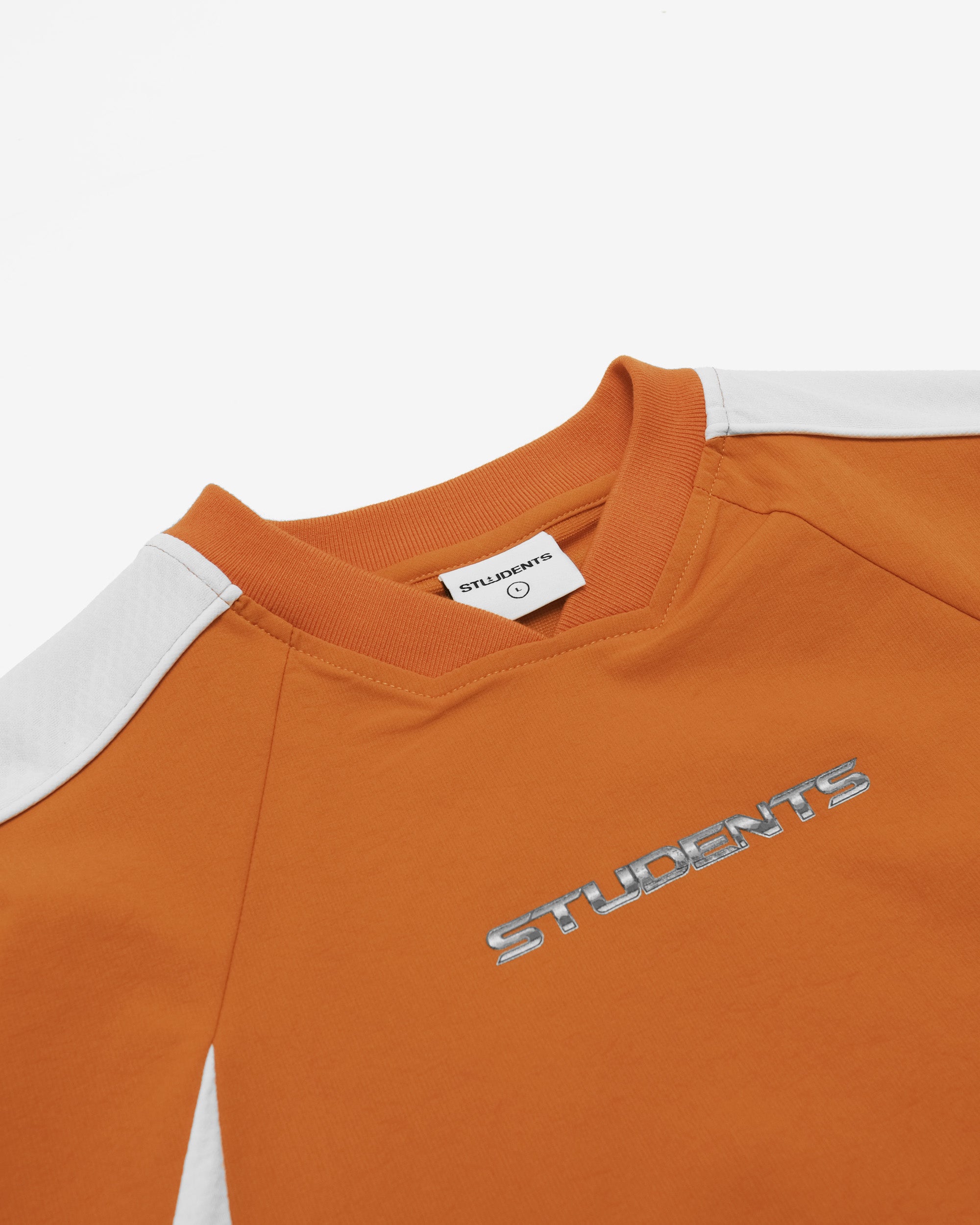 Orange sweatshirt with 'STUDENTS' text and white accents on a white background