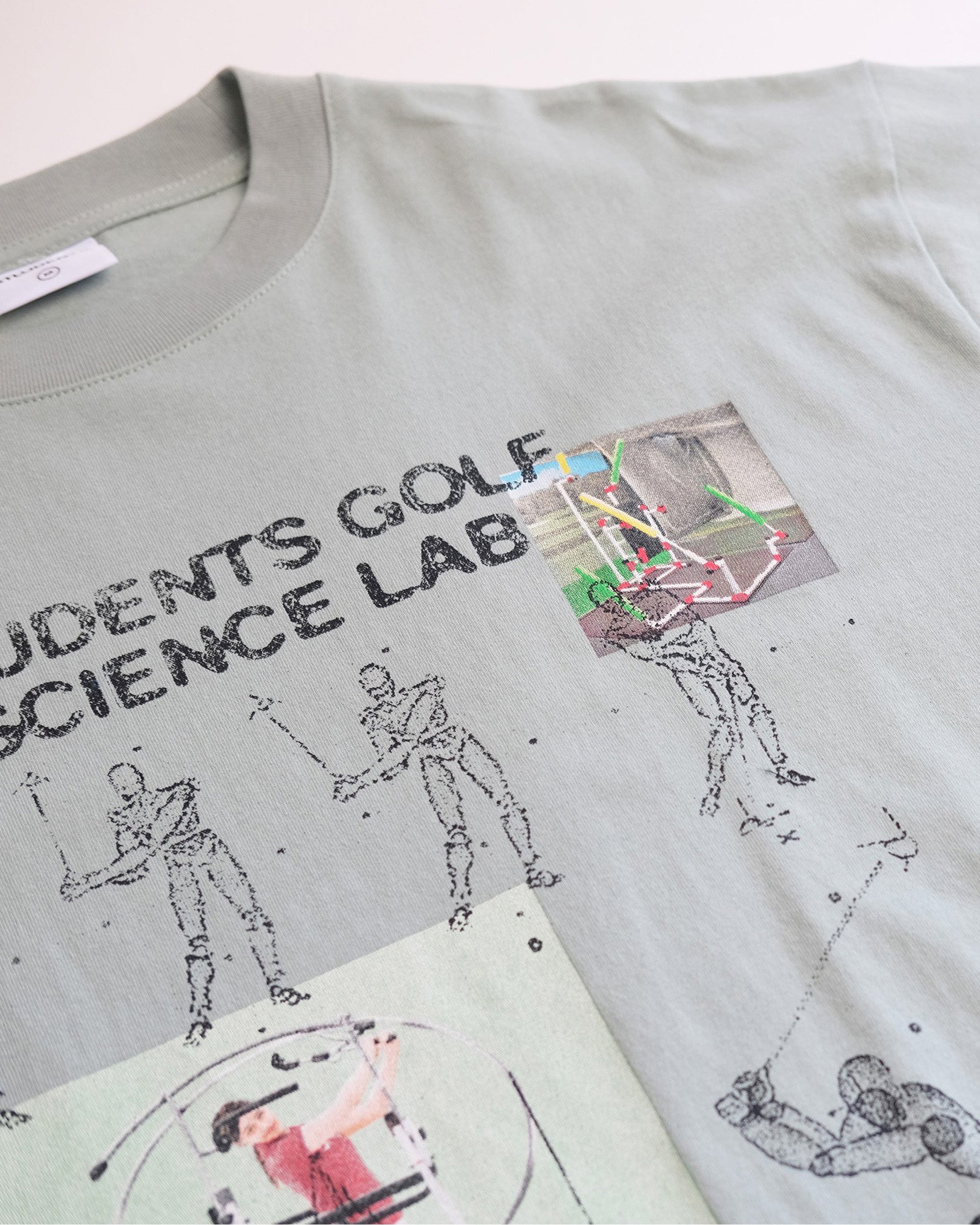 Gray t-shirt with graphics and text on a white background
