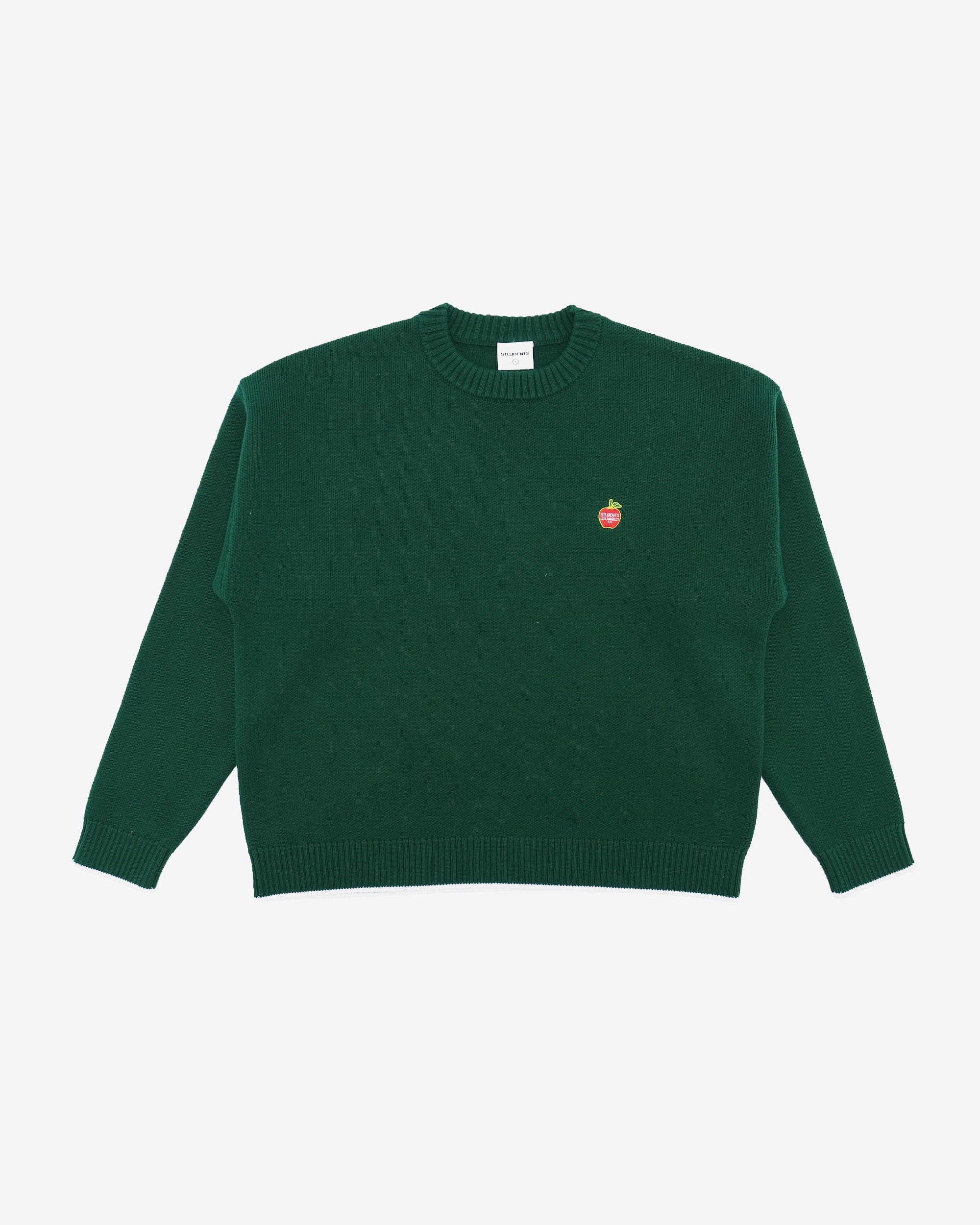 Green sweater with a small apple logo on a white background