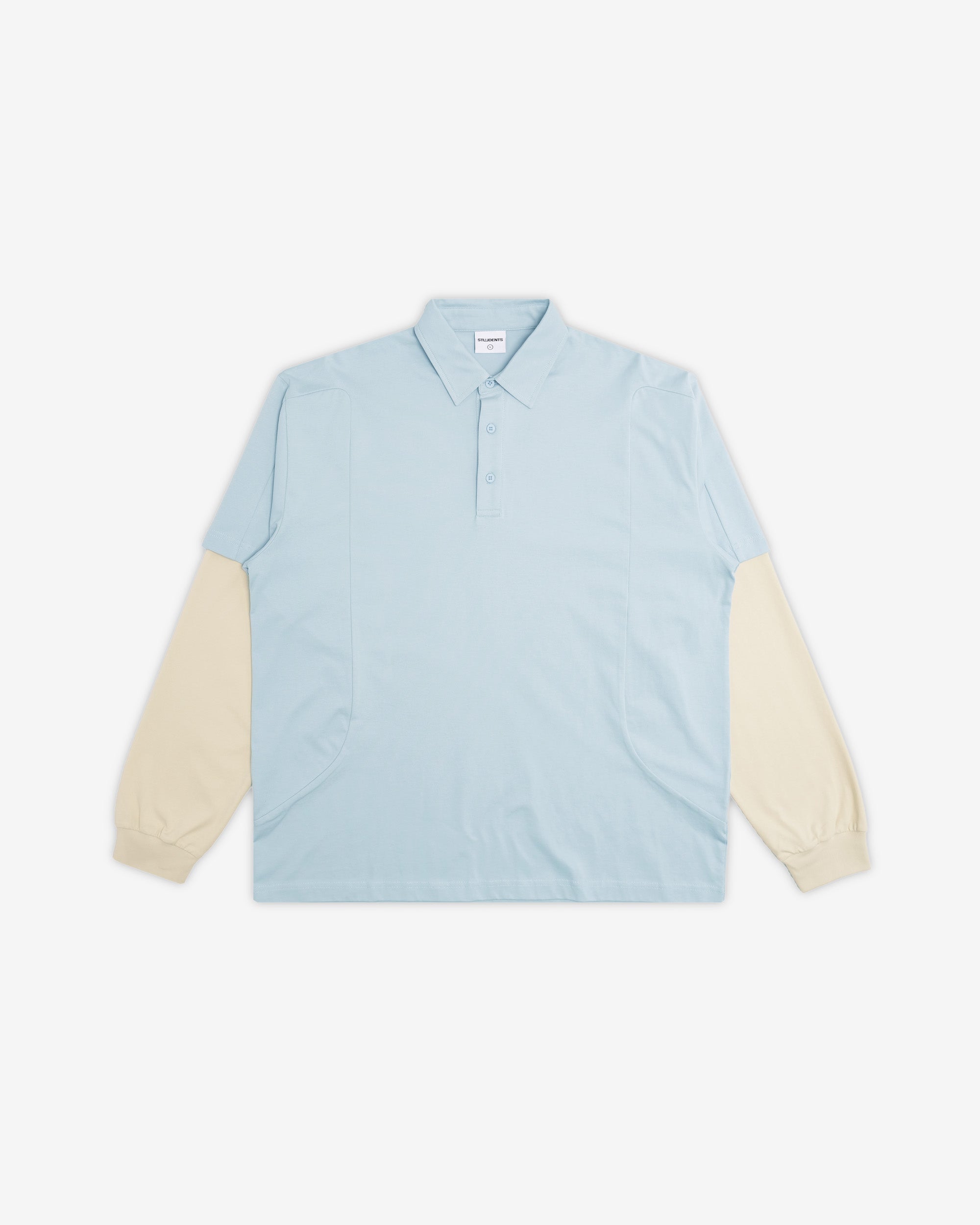 Light blue shirt with beige sleeves on a white background