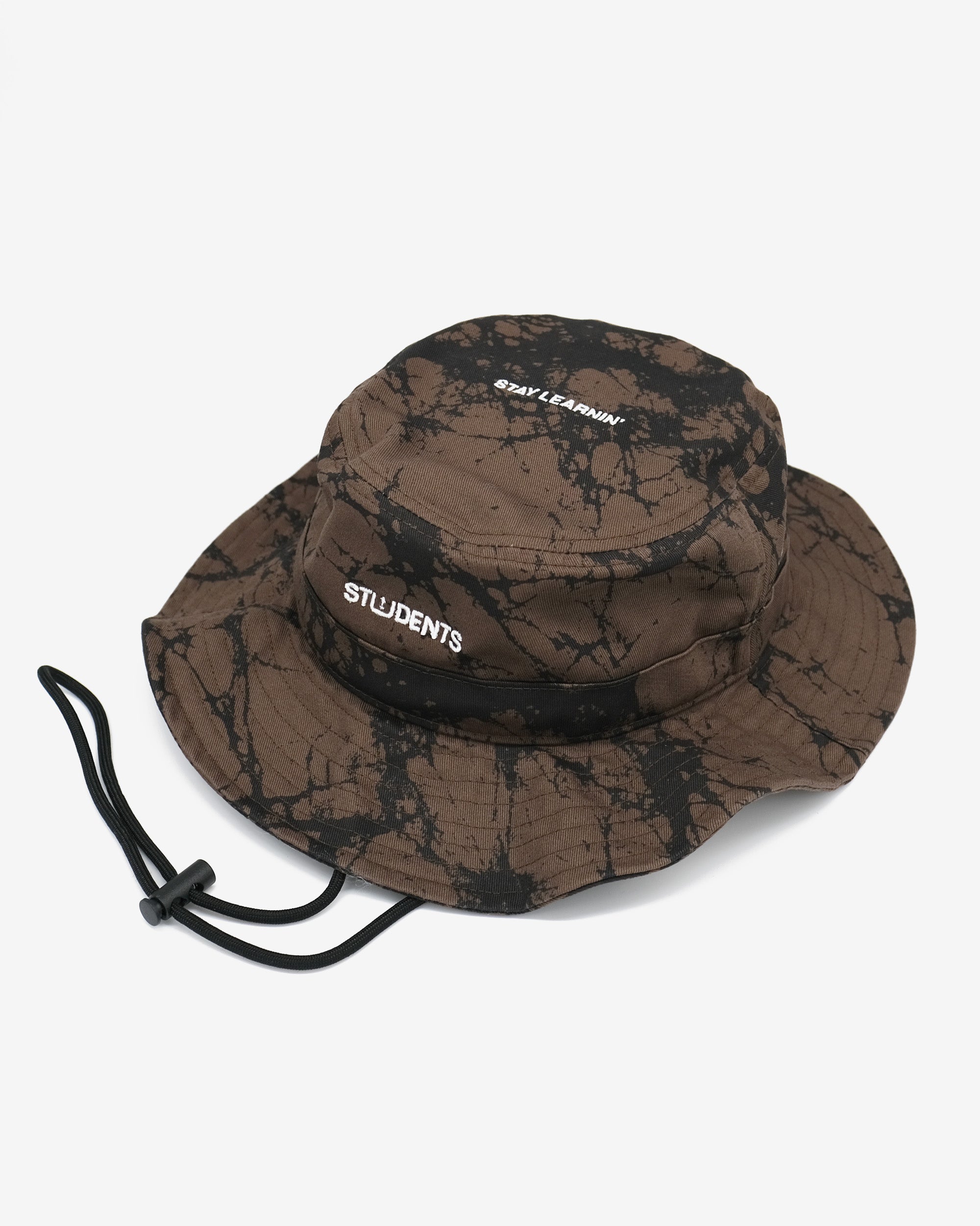 Brown camouflage bucket hat with a drawstring on a white background