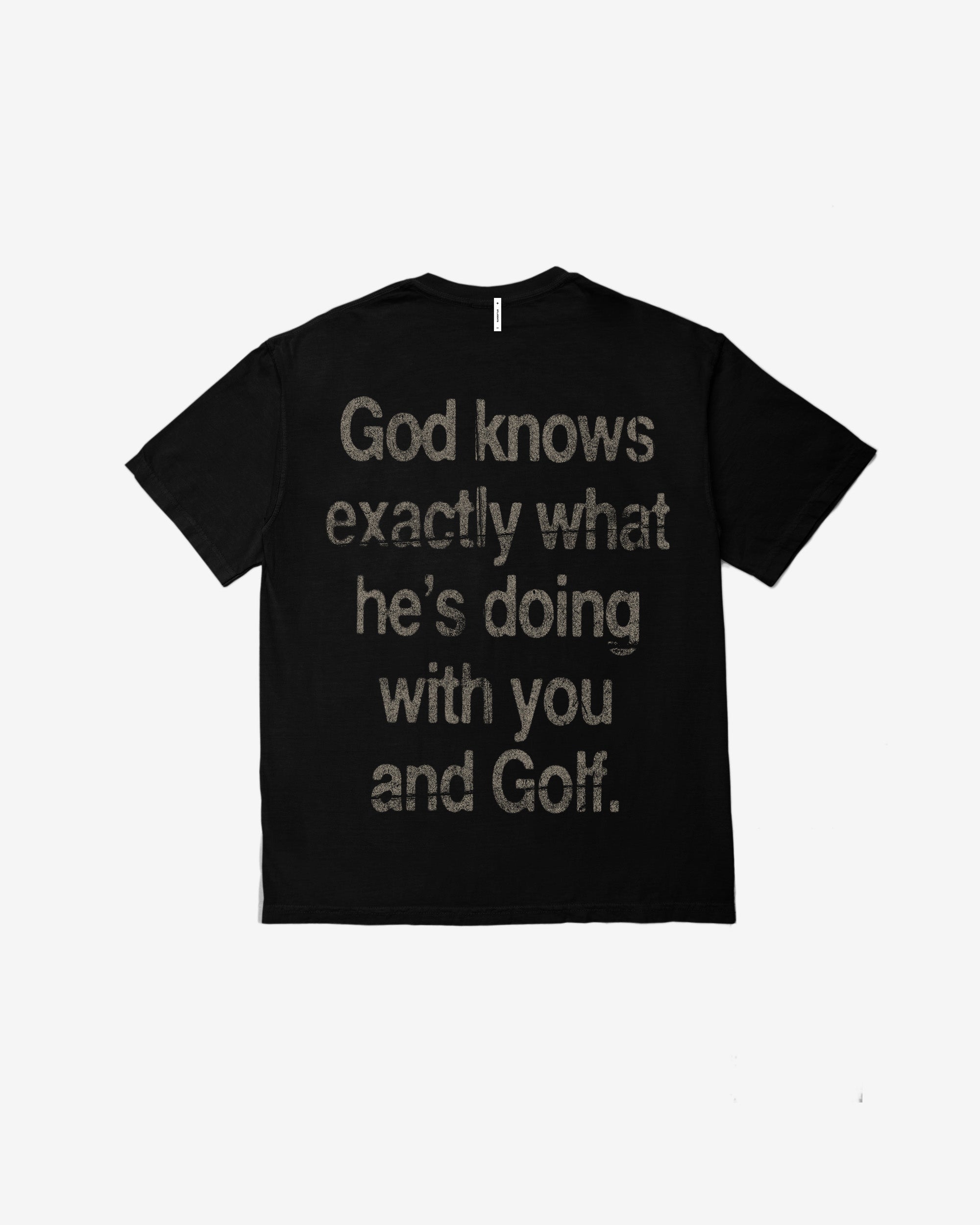 Black t-shirt with white text 'God knows exactly what he's doing with you and Golf.' on a white background
