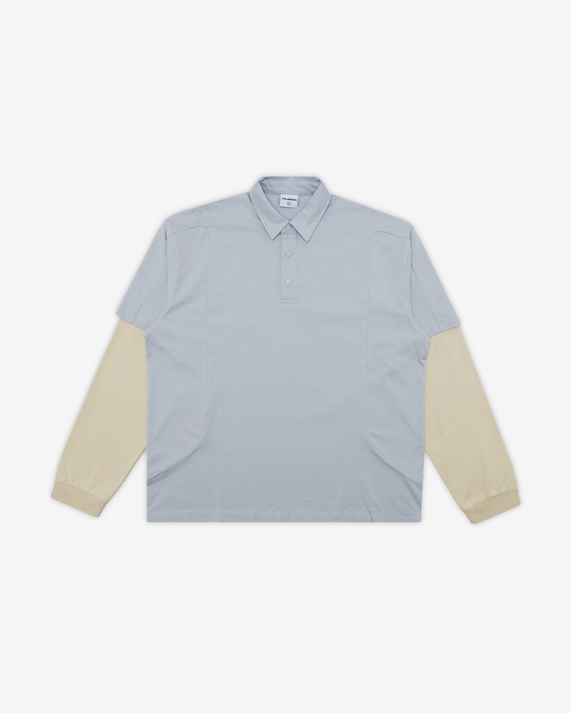 Light blue shirt with beige sleeves on a white background